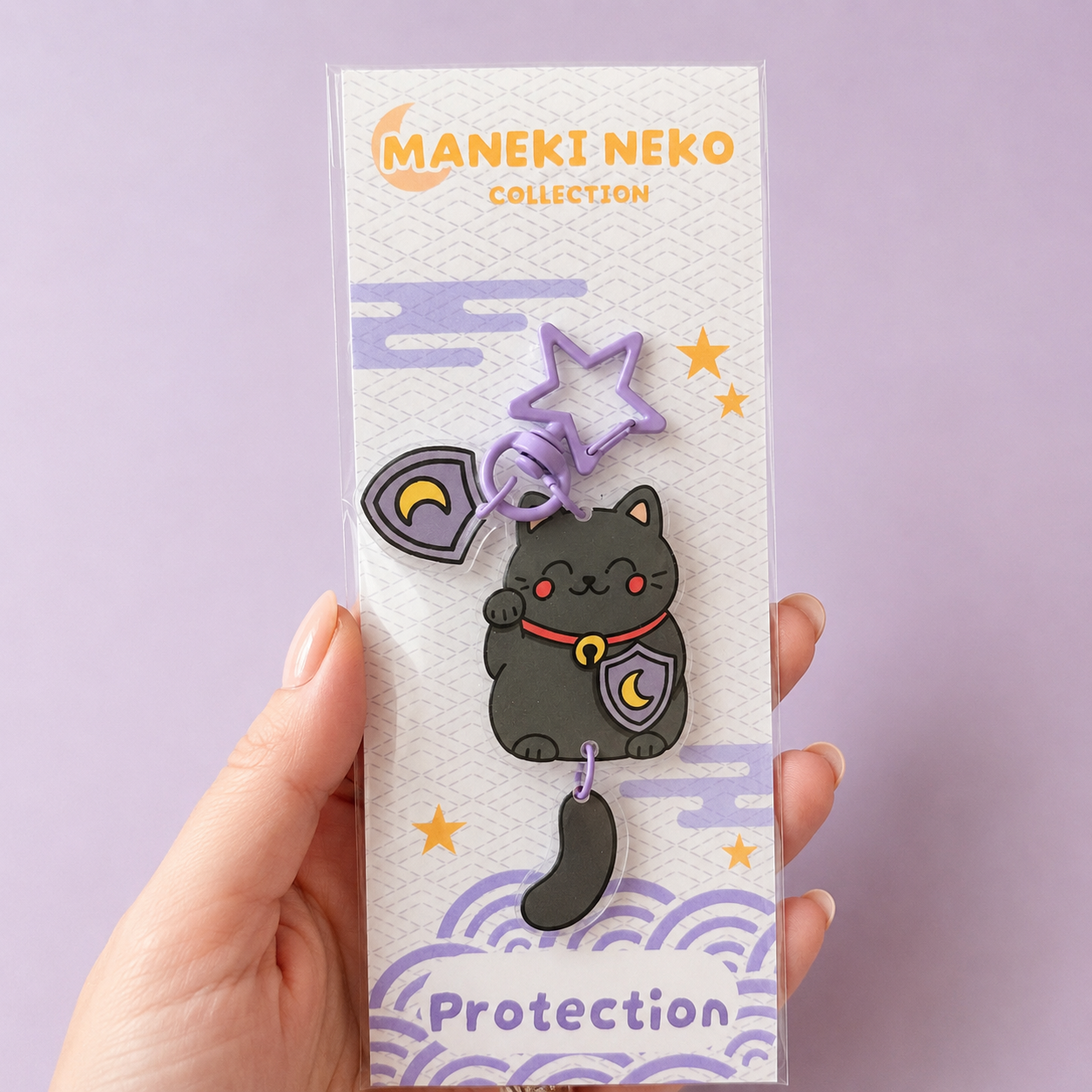 Porte-clé Maneki Neko Protection présenté sur sa carte illustrée